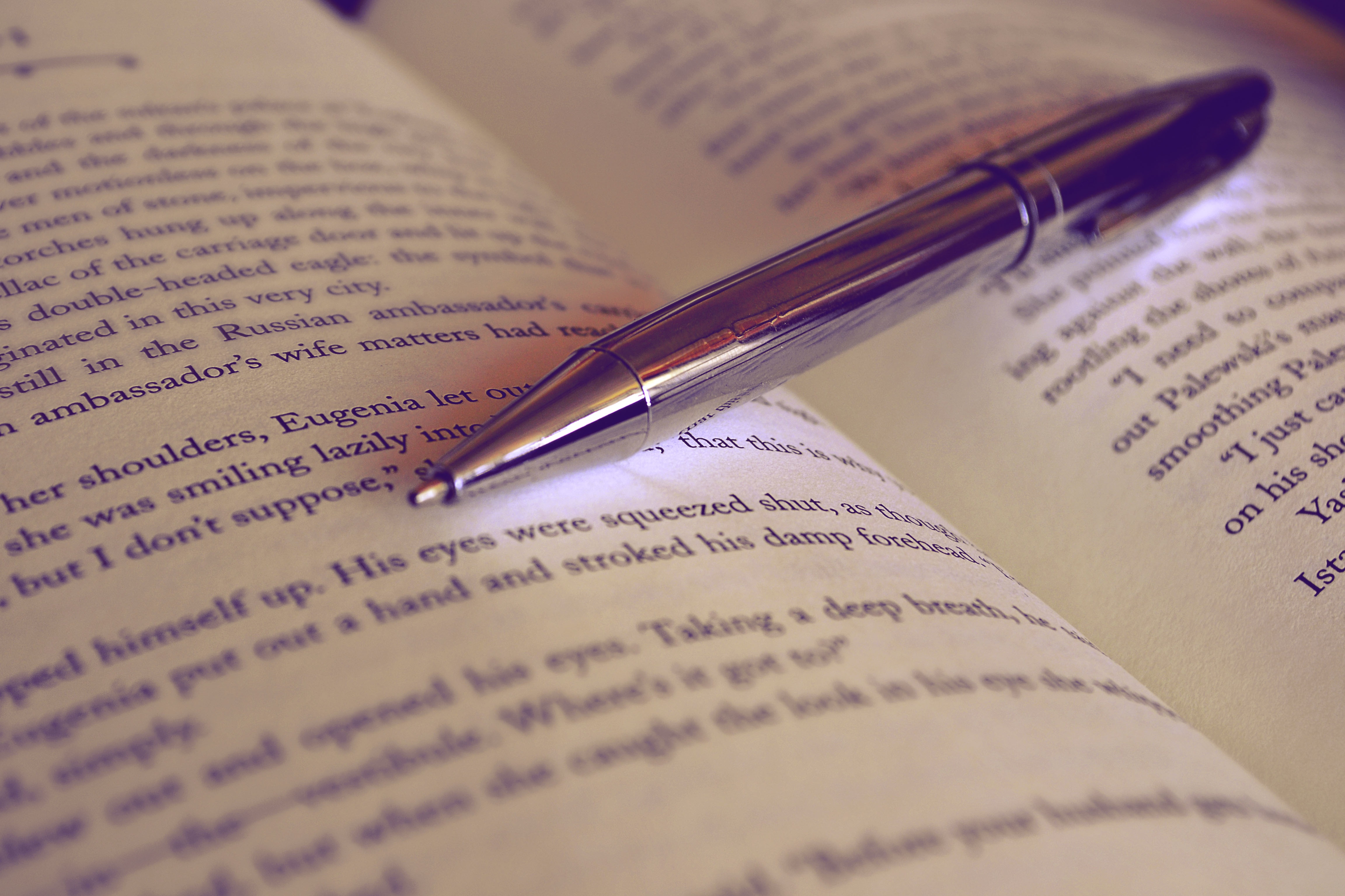 pen displayed on an open book